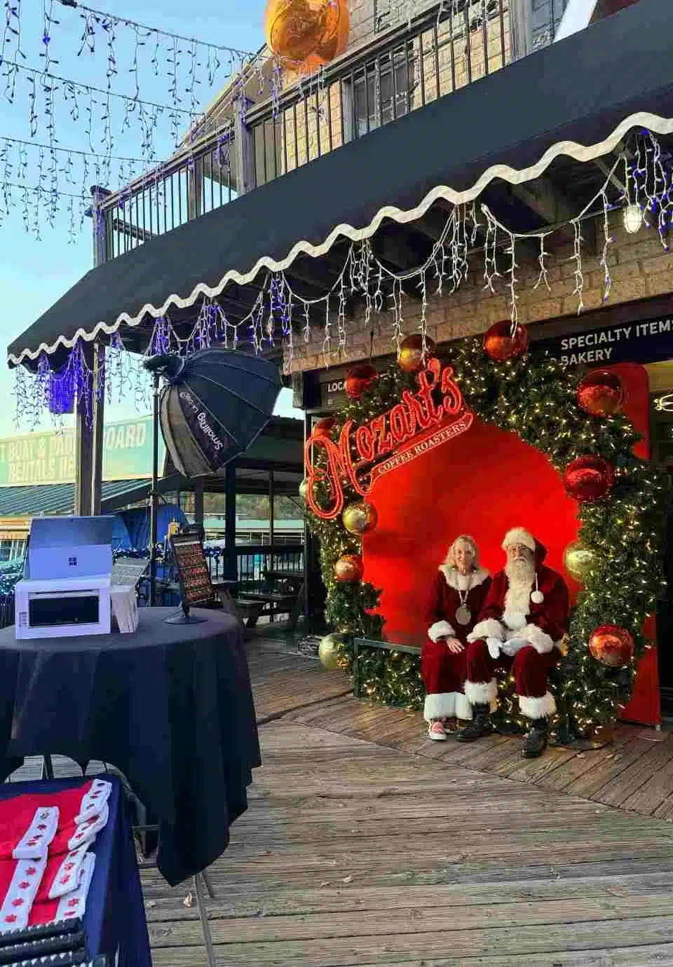 Holiday photo booth setup with Santa and Mrs. Claus at Mozart’s Coffee Roasters in Austin, Texas by Keopix