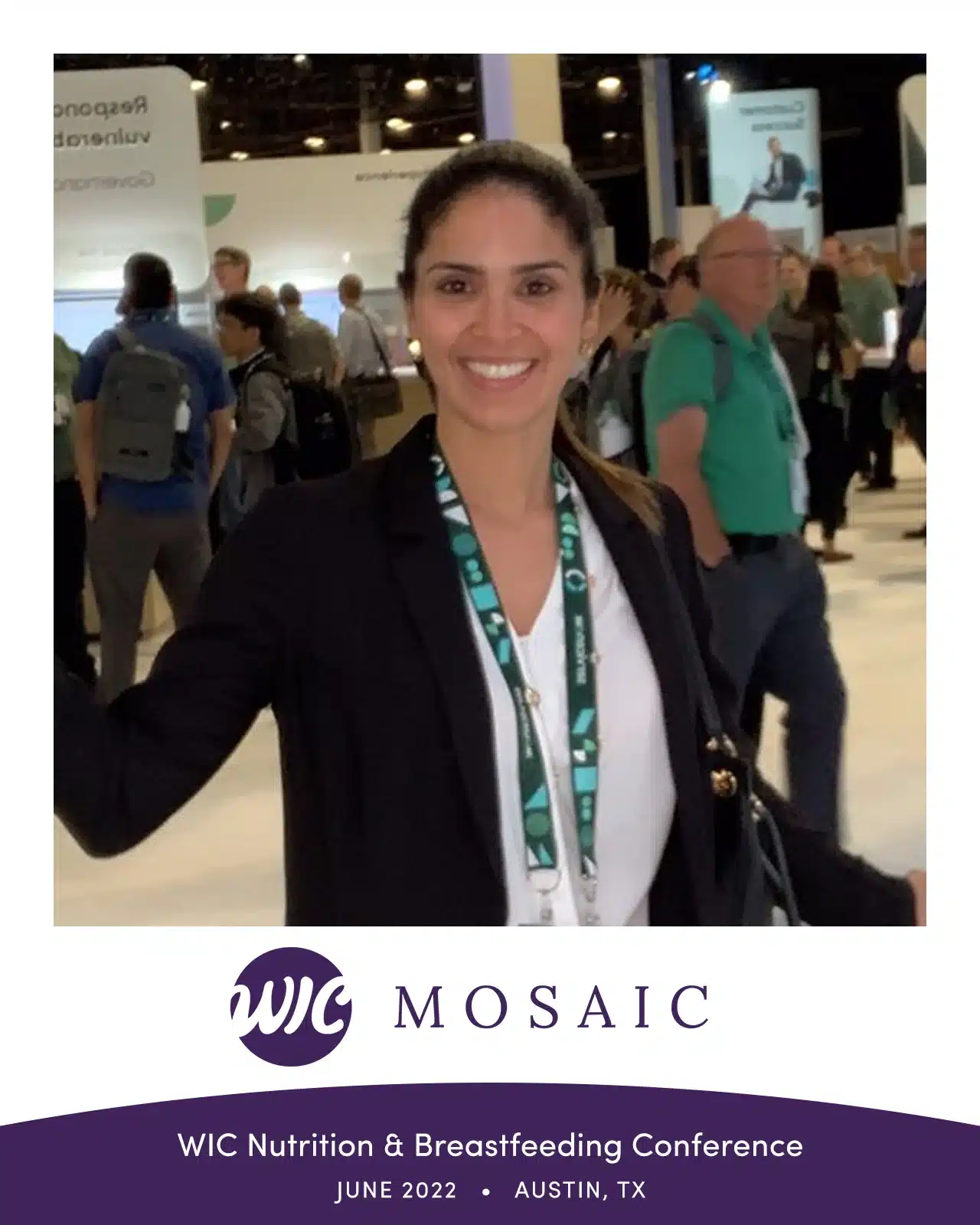 Smiling guest holding a printed photo tile at the Keopix mosaic photo booth during a WIC event